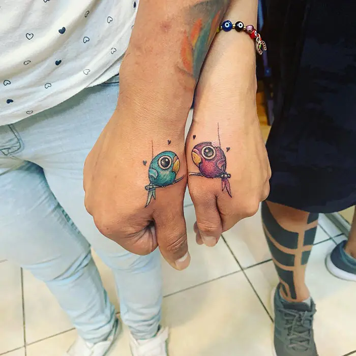 matching tattoos couple love birds