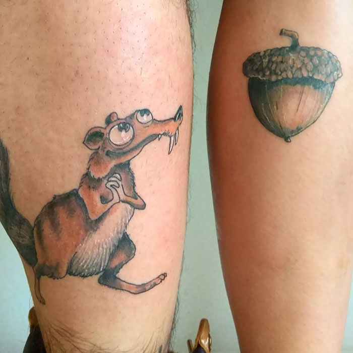 matching tattoos couple scrat acorn