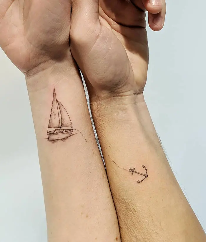 matching tattoos couple ship anchor