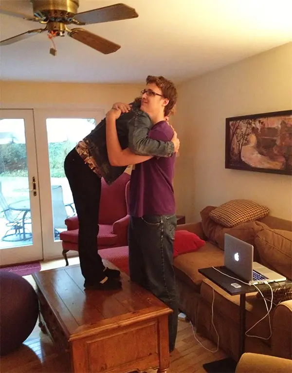 tall people struggles hugging mom