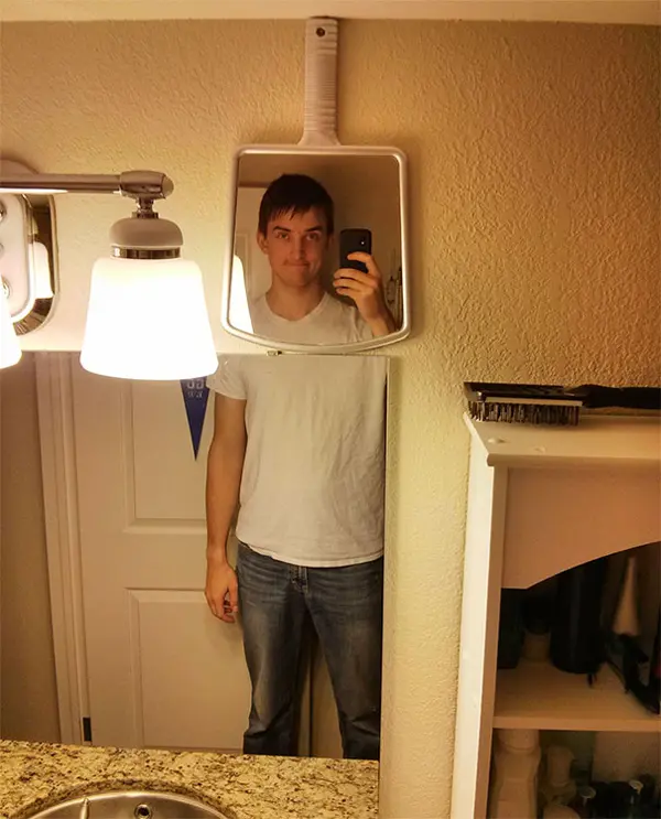 tall people struggles mirror selfie