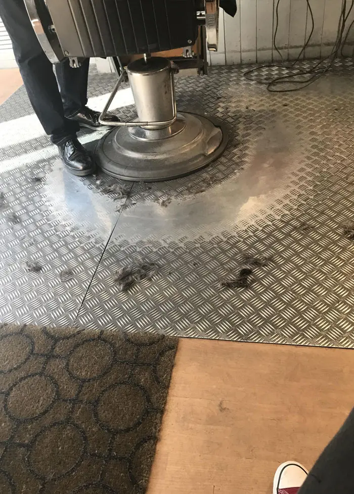 things worn down by time barbershop metal floor