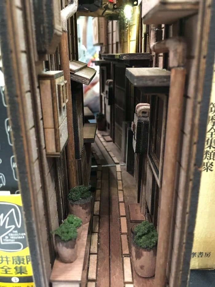 monde back alley bookshelves dioramas