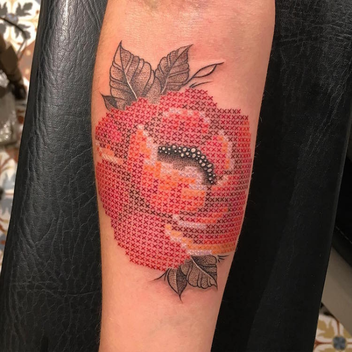cross stitched style flower best floral tattoo artists