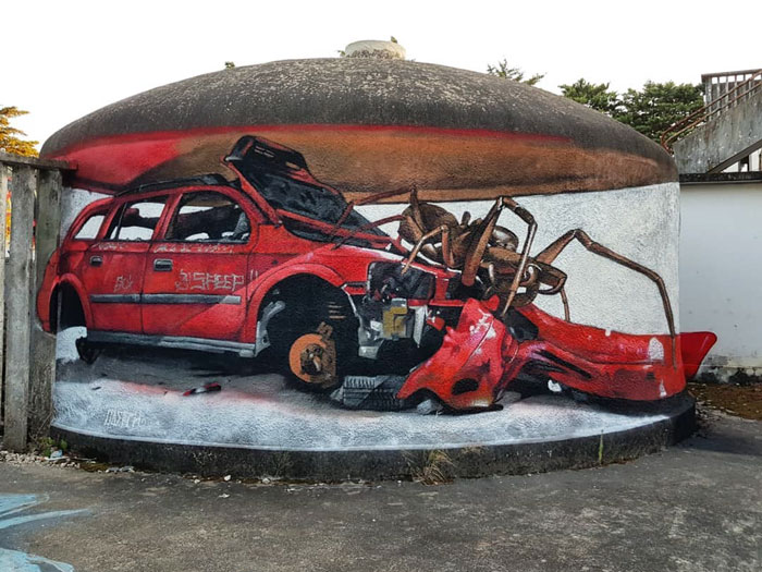 encounter with huge insect red car art graffiti object transformations bus artist odeith