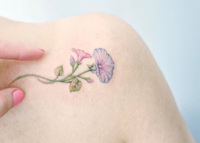 flower near left shoulder best floral tattoo artists