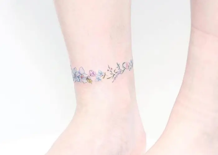 flower ring on lower leg best floral tattoo artists