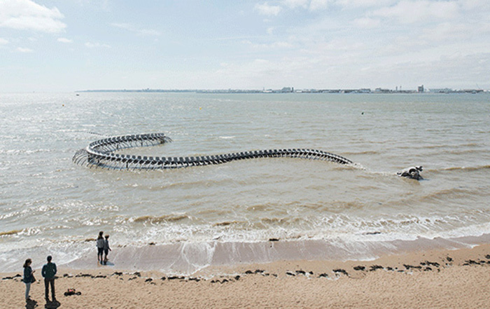 giant serpent sculpture estuary nantes france