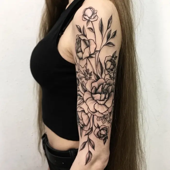 left arm black sketches of flowers best floral tattoo artists