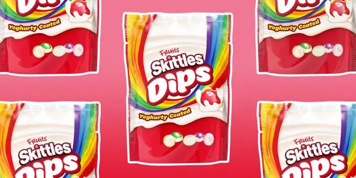 skittles dips candy in creamy yogurt flavored coating