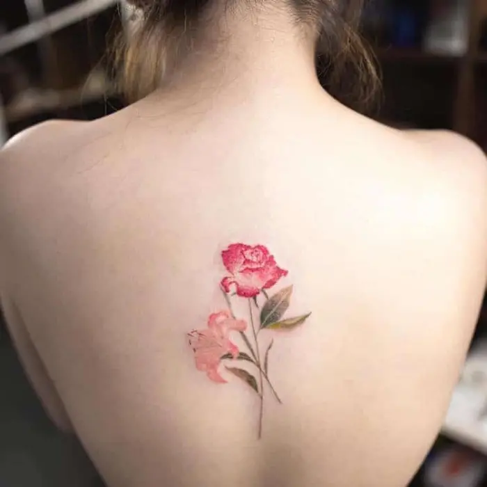 sweet flowers on back best floral tattoo artists