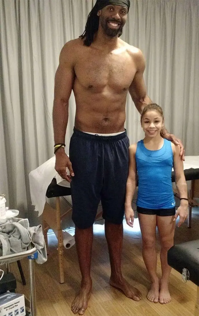 tall people with short people gymnast vs basketball player