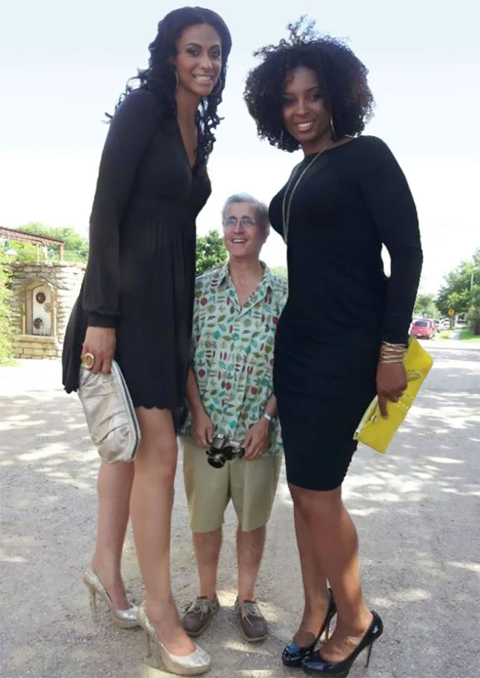 tall people with short people sandwiched