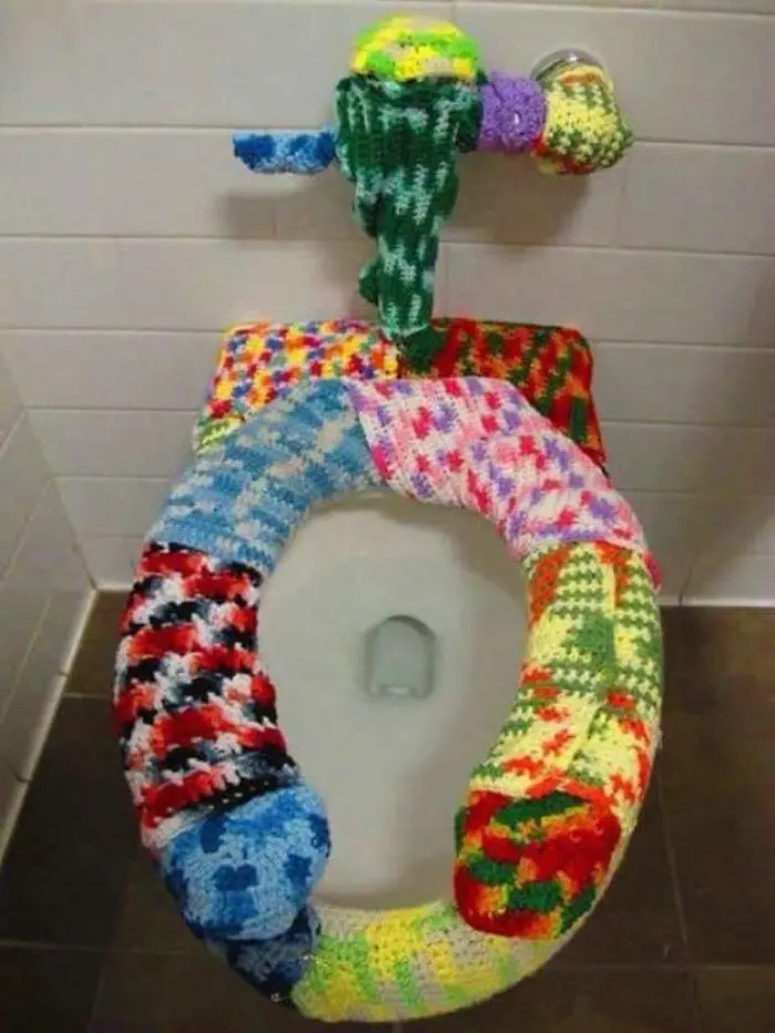 toilet completely covered with crocheting