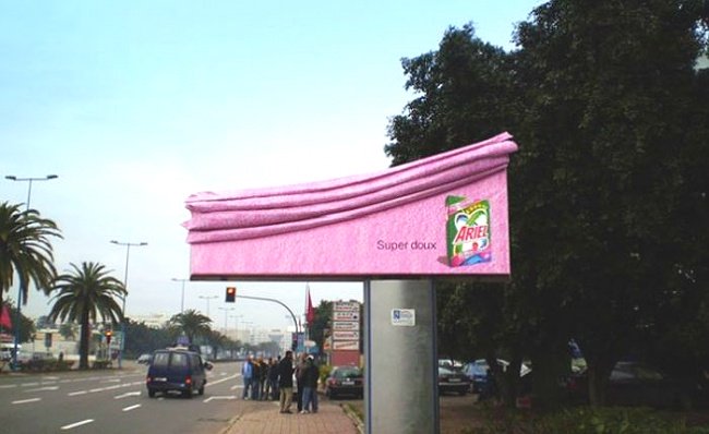 Ariel Detergent Advertisement Featuring a Softened Billboard