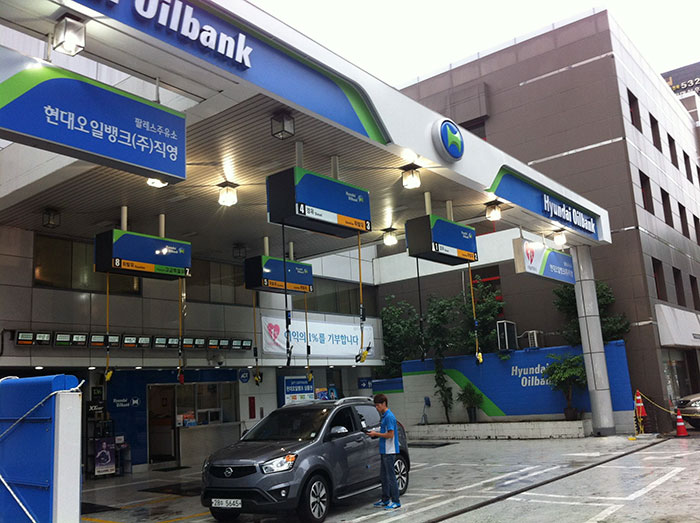 Gas Pumps Hanging from the Roof of a Korean Gas Station