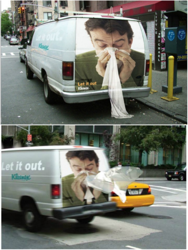 Kleenex Transit Advertisement Featuring a Man Blowing His Nose