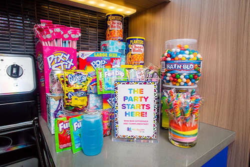 Lisa Frank-Themed hotel room mini bar snacks