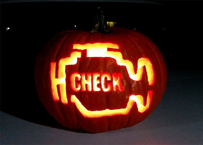 Pumpkin with Check Engine Light Carving