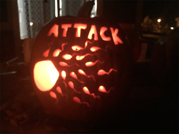 Pumpkin with Sperms Attacking an Egg Carving