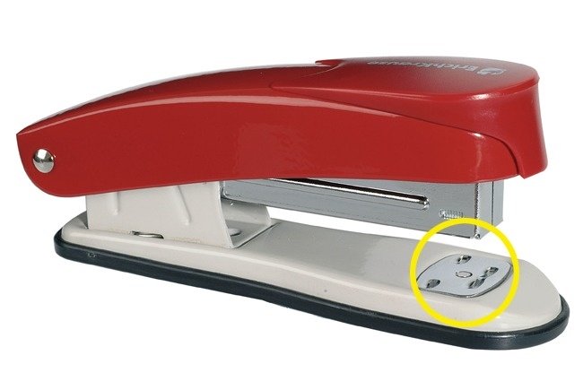 Stapling Plate of a Red Stapler Indicated by a Yellow Circle