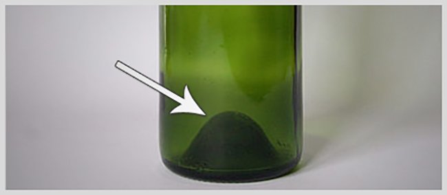 White Arrow Pointing to a Wine Bottle Punt