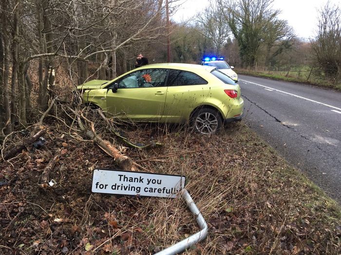 car crashes into sign ironic moments