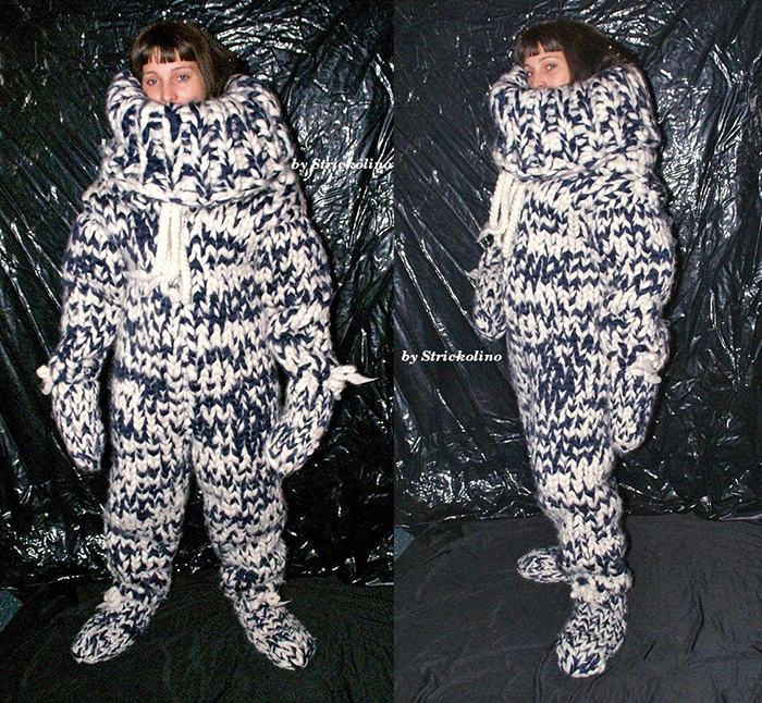 white and navy knitted adult onesie