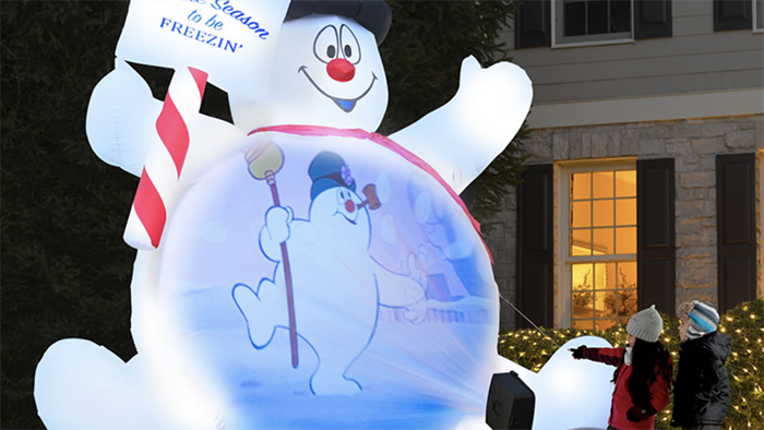 Children watching projection on Inflatable Frosty The Snowman Belly