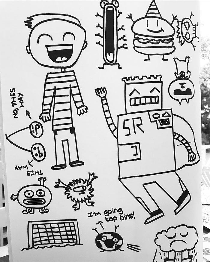 Doodle of a Boy with a Robot, a Buger, Aliens, and Smileys