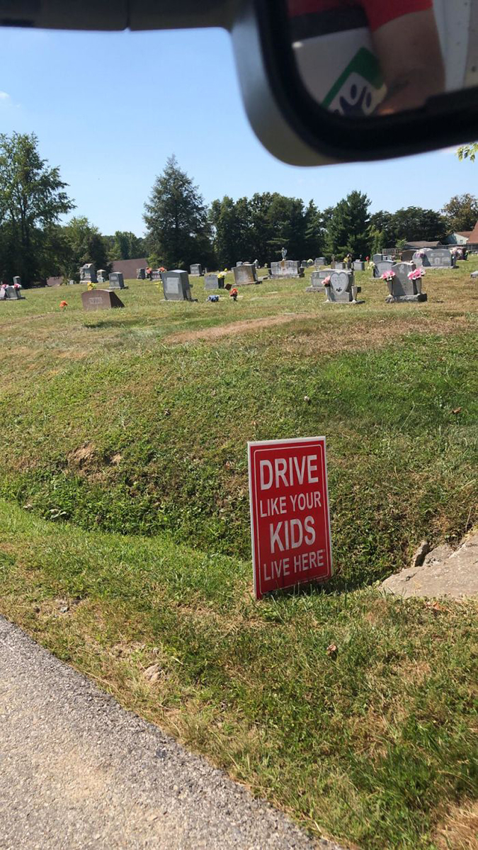 Funny Threatening Signs cemetery