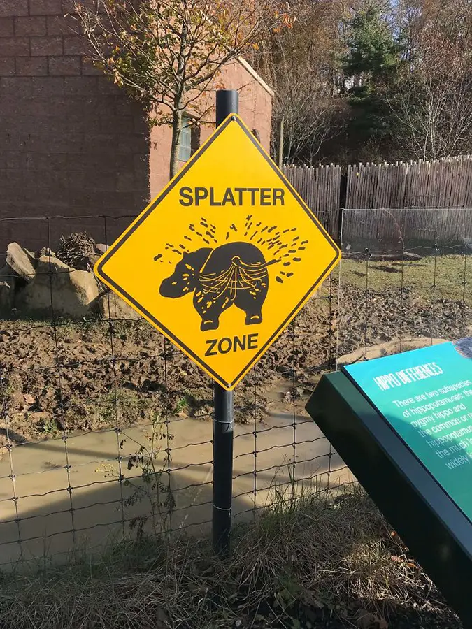 Funny Threatening Signs hippo exhibit