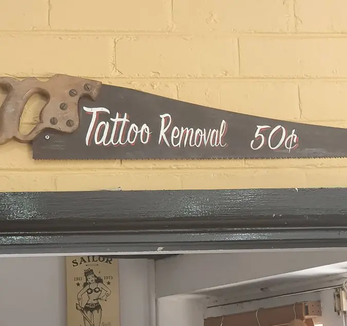 Funny Threatening Signs tattoo shop