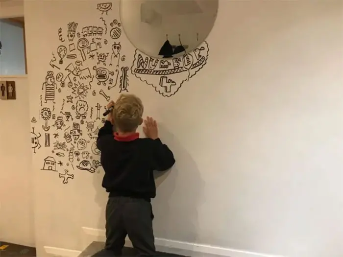 Joe Whale Doodling on the Center Part of a Wall