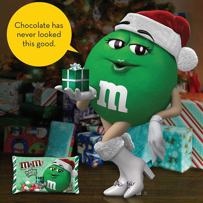 M&M's Ms. Green Holding a Small Gift Box