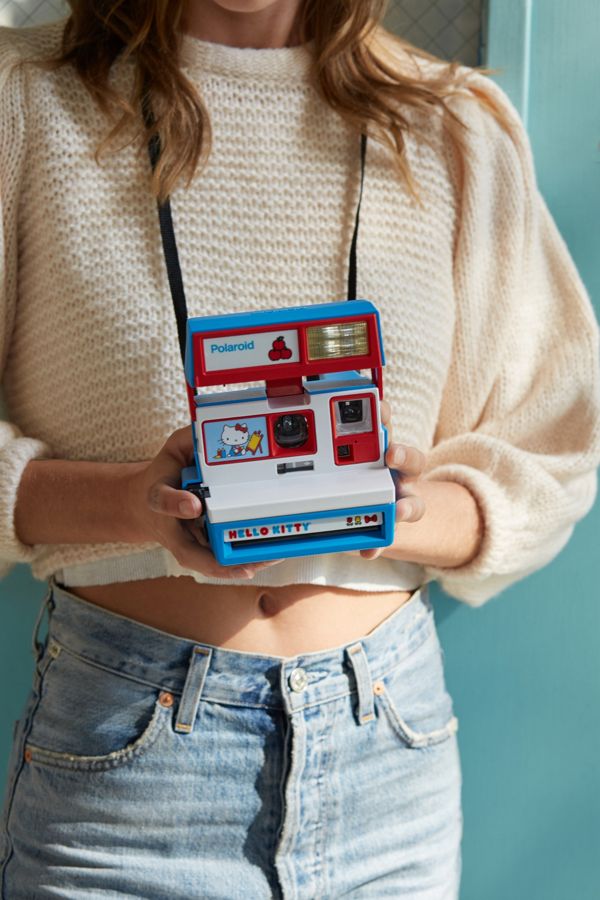 hello kitty polaroid camera on model