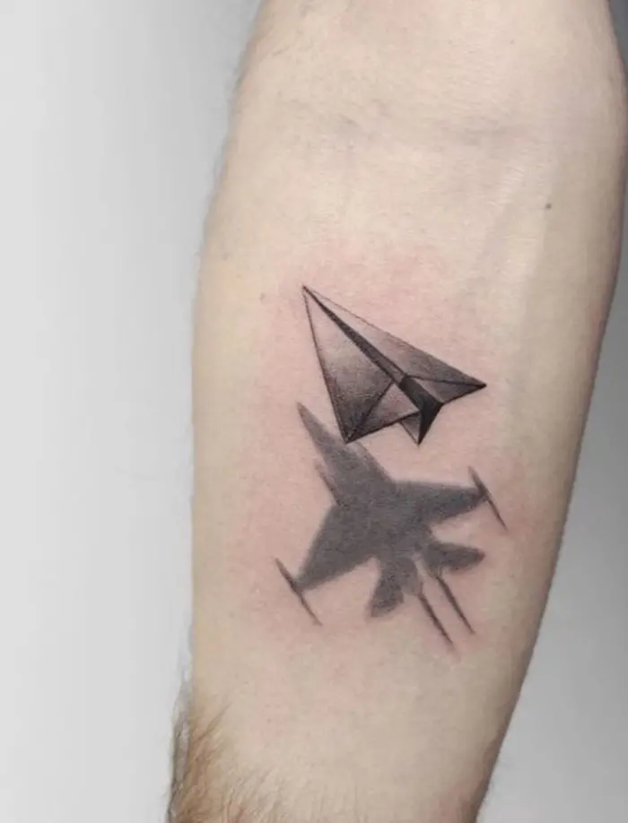unusual tattoos paper plane shadow