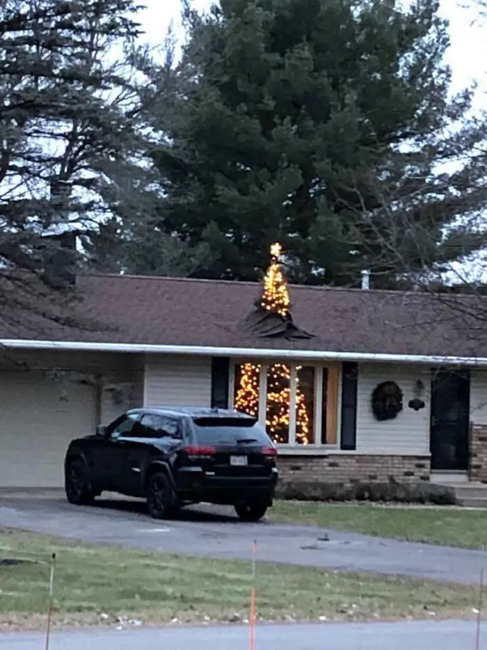 creative christmas tree roof breaking