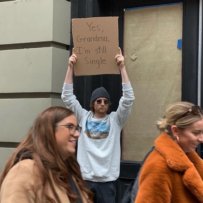 dude with sign single
