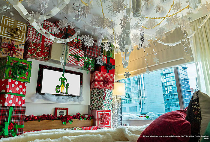 the ceiling and wall decor of the bedroom