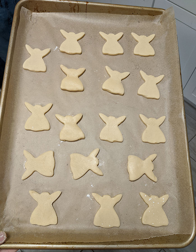 tray of unbaked baby yoda cookies
