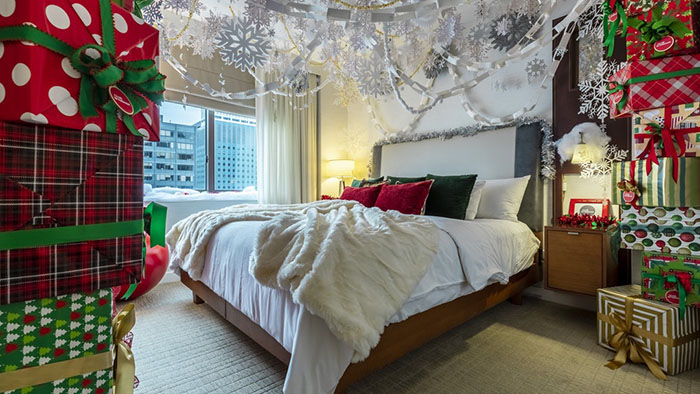 winter wonderland suite giftbox-filled bedroom