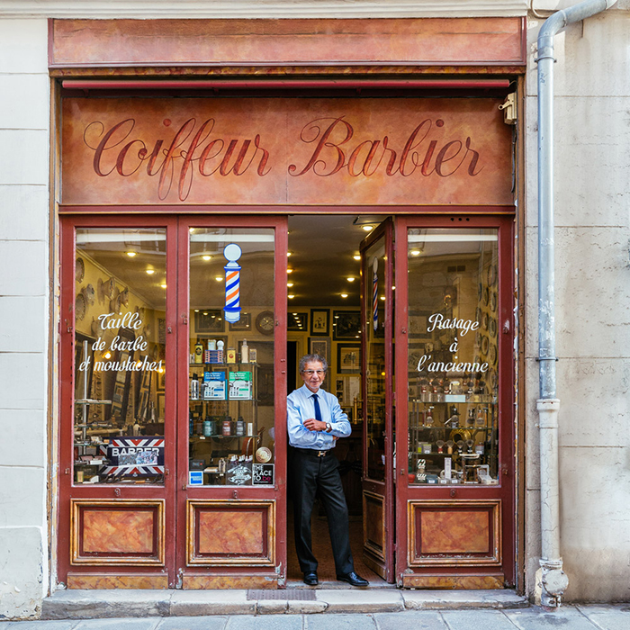 Alain at Coiffeur Barbier Storefront