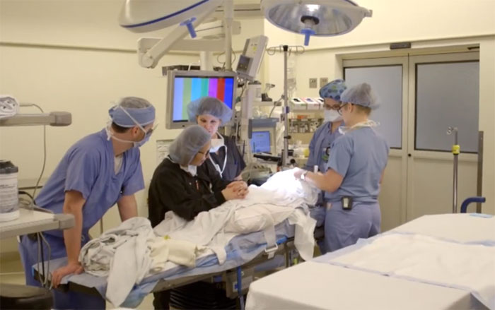 Dr. Robert Parry and his colleagues in the operating theatre