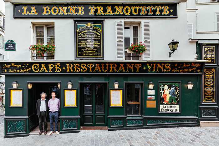 Luc Fracheboud and Father Patrick at La Bonne Franquette Storefront