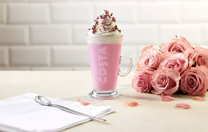 Ruby Cocoa Hot Chocolate with a bouquet of delicate pink roses