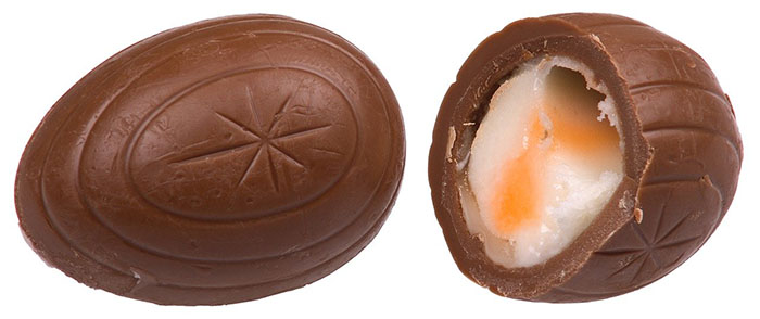 a whole creme egg and one cut in half