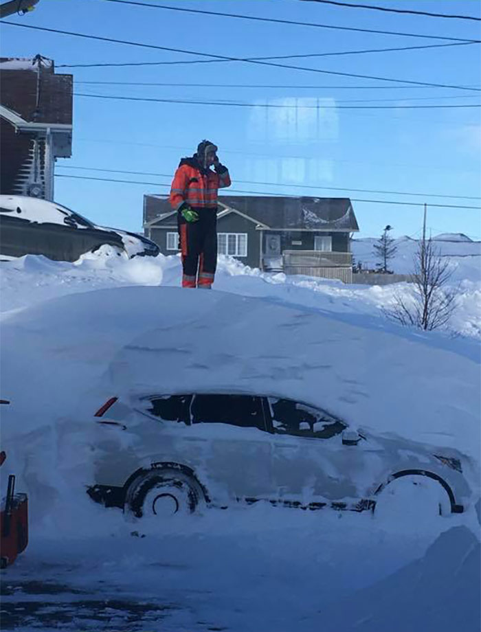 canada blizzard car buried in snow