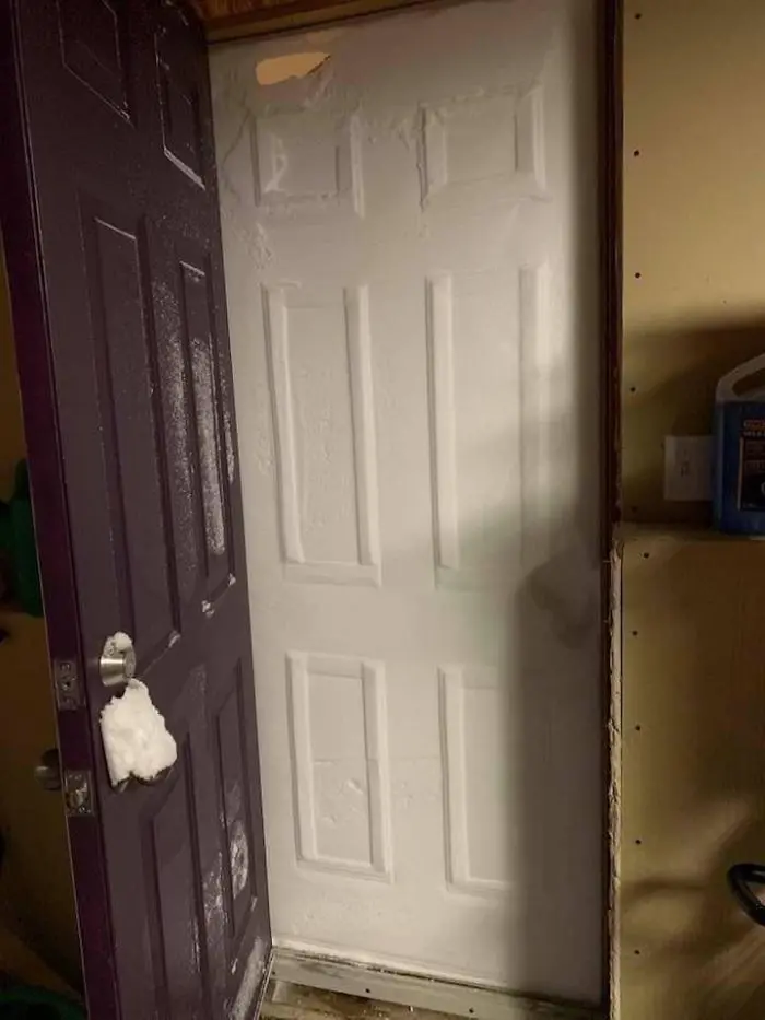 canada blizzard frozen door