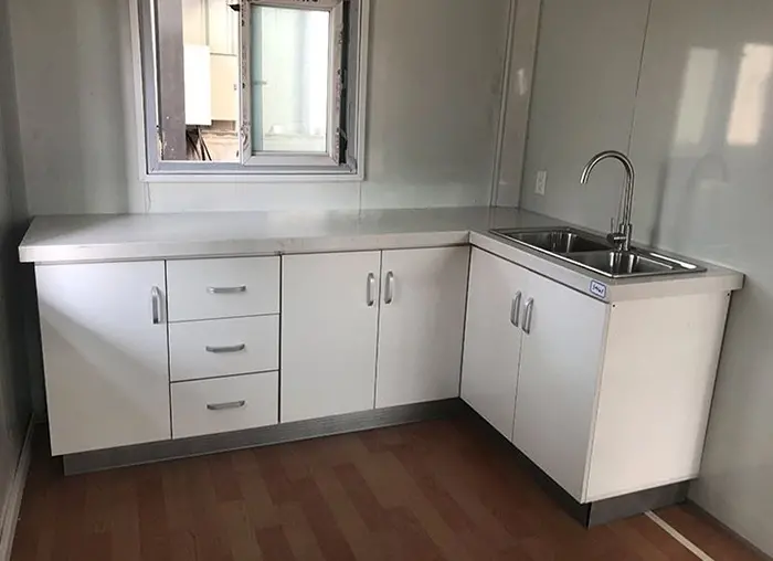 kitchen island inside the expanding tiny home